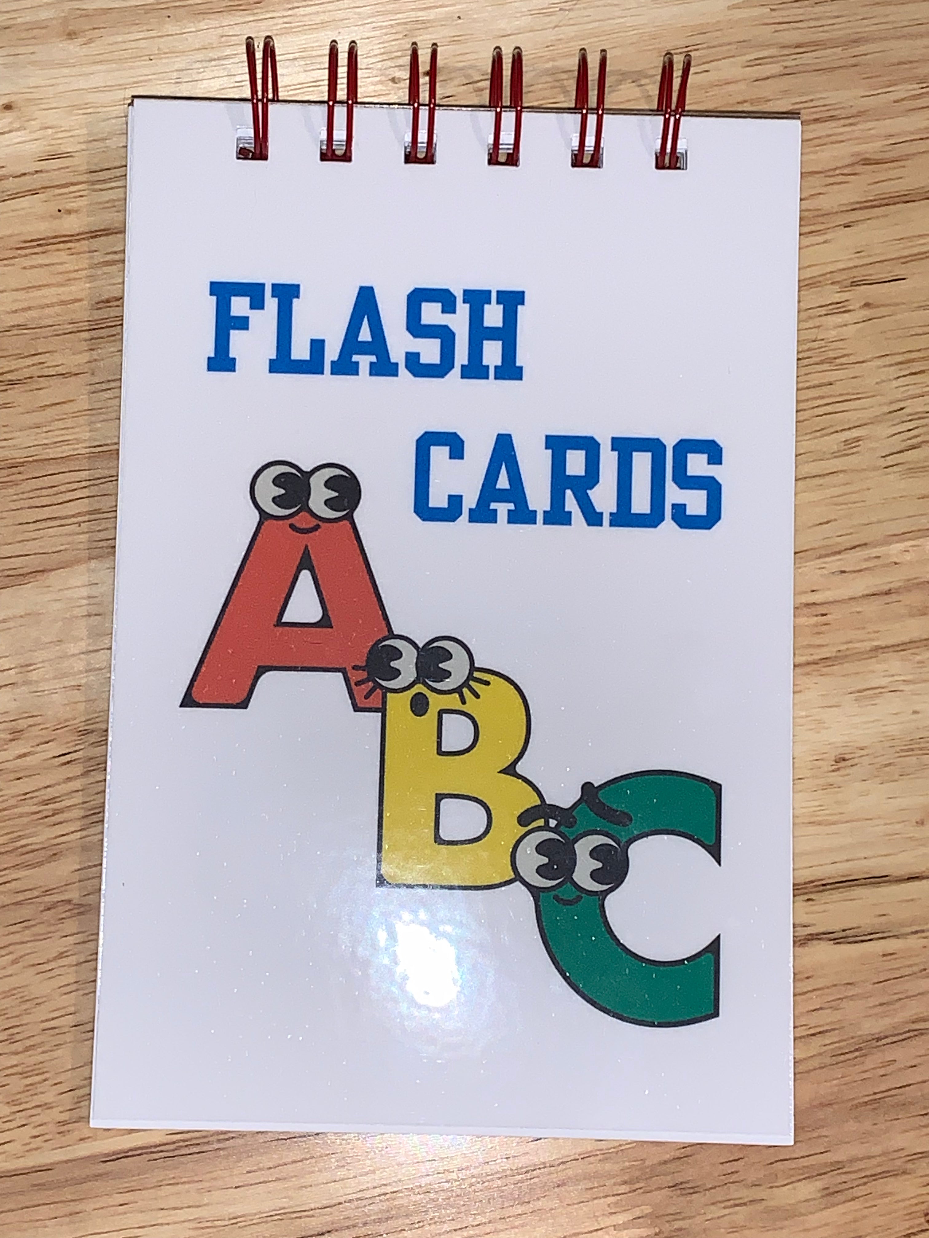 Flash card book with colorful letters A, B, C 