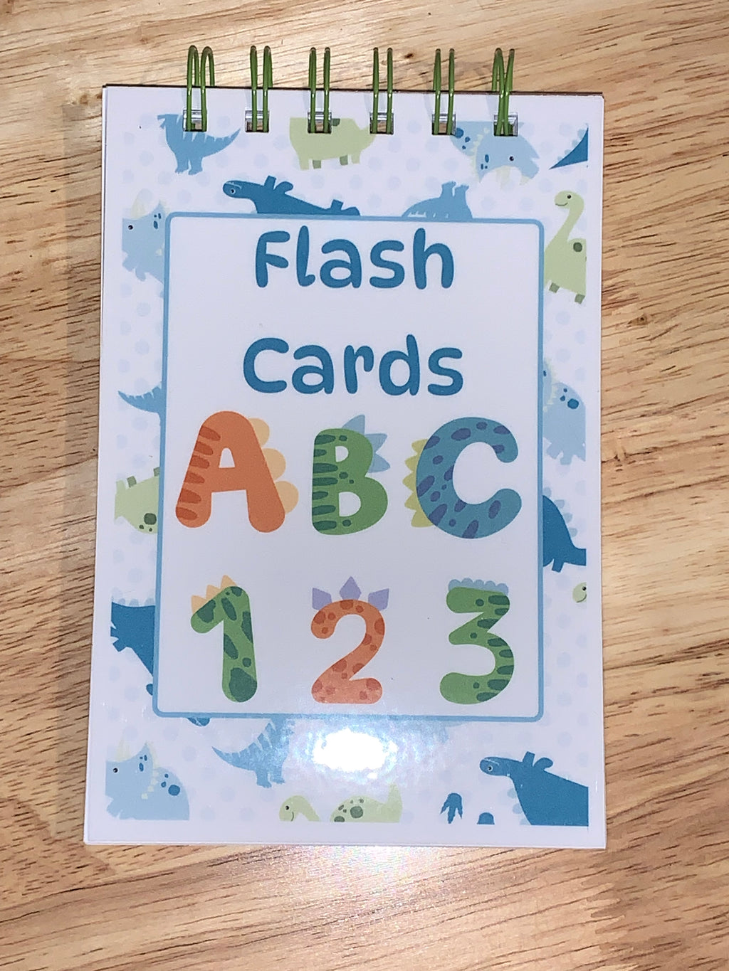 Flash cards with letters, numbers, and dinosaurs theme