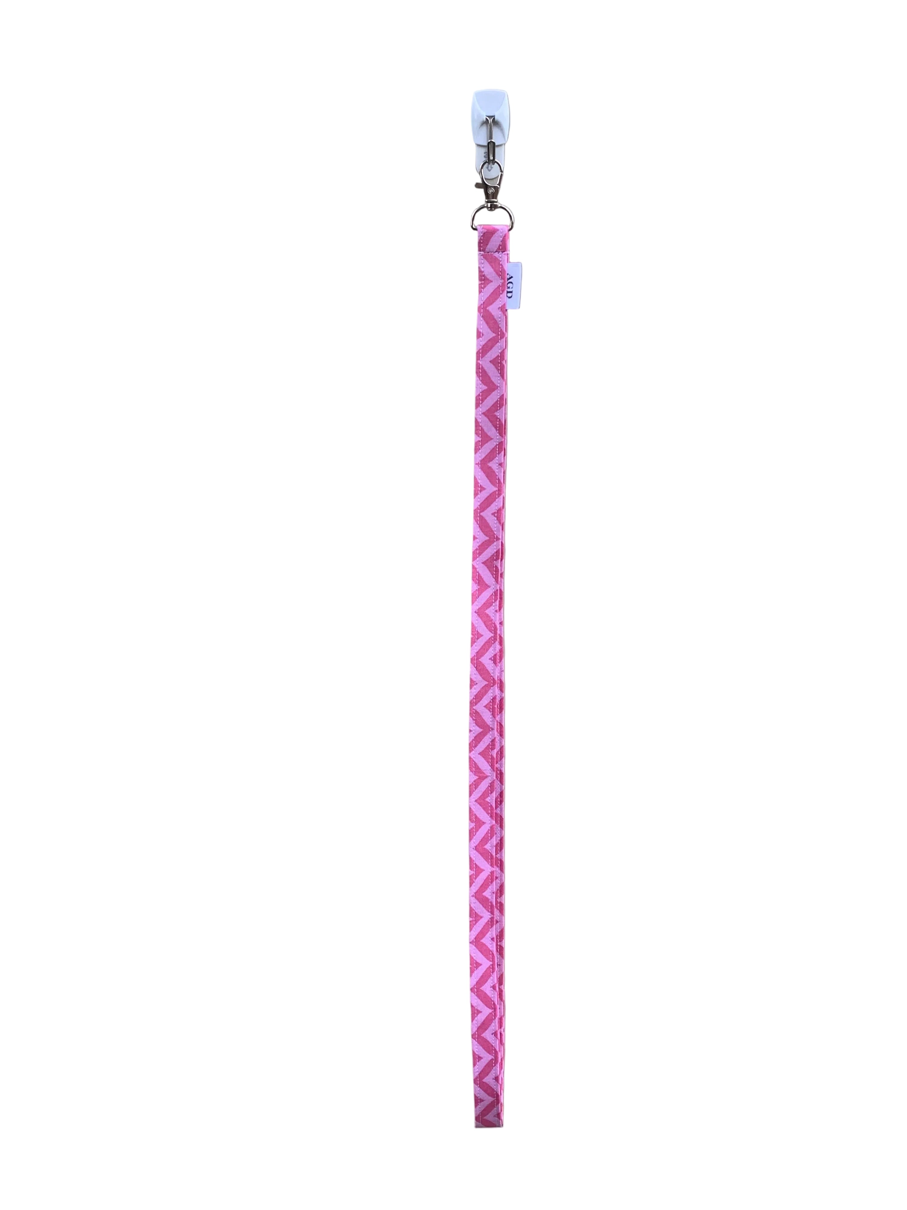 Pink lanyard with a zigzag pattern on a light gray background