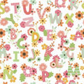 Alphabet and floral pattern with a ruler at the bottom for scale.