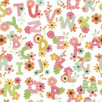 Alphabet and floral pattern with a ruler at the bottom for scale.